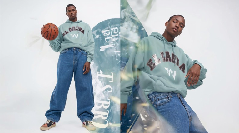 El Cabra Model representing the sportif fusion with a muted teal hoodie and baggy jeans